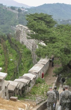 South Korea-based American soldiers walk the Mount Bagak trail