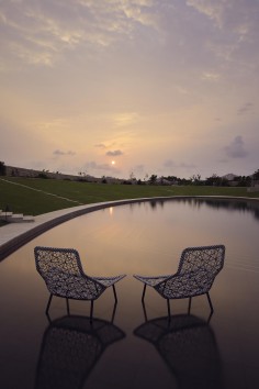 The long, sleek pool that serves as the heart of the resort.