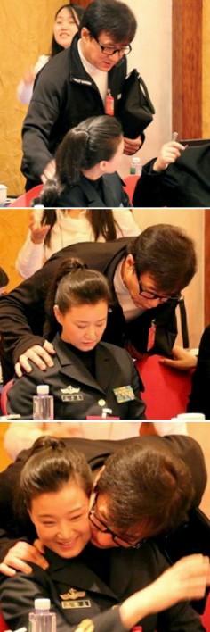 Action star Jackie Chan playfully cuddles up to singer Song Zuying during a CPPCC meeting in Beijing last week. Photos: SCMP