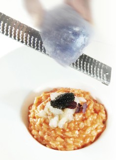 Persian Blue salt grated on red prawn risotto, malossol caviar and Maltese scampi crudo.