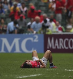 HKCC fullback Rowan Varty was mowed down by a two-man tackle. Photo: Nora Tam