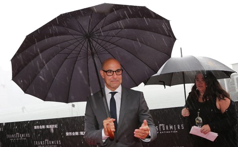 Stanley Tucci in the downpour