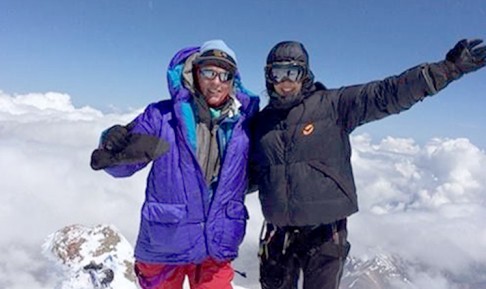 Sophie and friend Tina Bowman at the summit of the final volcano, Mount Elbrus in Russia. Photo: Sophie Cairns