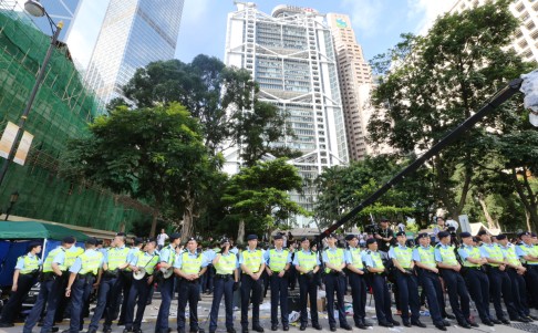 Police this morning were out in force in Hong Kong's Central district after roads were cleared of protesters. Photo: SCMP