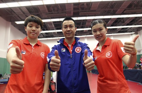 Hong Kong's Doo Hoi-kem, with coach Li Ching and teammate Lee Ho-ching, will compete in the 2015 World Table Tennis Championship in Suzhou, China. Photos: May Tse