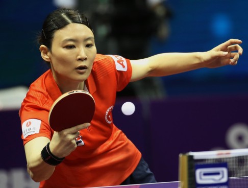 Hong Kong's Jiang Huajun fires back a return to China's Li Xiaoxia in the women's singles. Li was too good, winning in straight games.