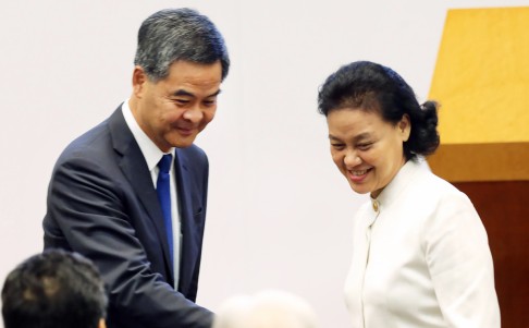 Leung Chun-ying with Guangdong vice-governor Zhao Yufang in Admiralty yesterday. Photo: David Wong