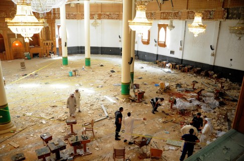 Medics at the Kuwait mosque (left) while police work at the scene of the attack in France. Photos: EPA, AP