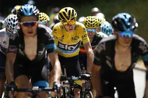 Team Sky rider Chris Froome of Britain keeps the race leader's yellow jersey after a steady stage 18. Photo: Reuters