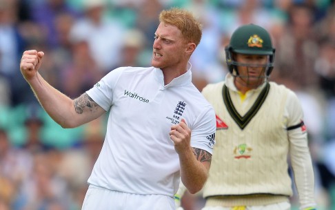 Australia's Steve Smith watches as England's Ben Stokes celebrates the wicket of Australia's Michael Clarke. Photo:  AFP