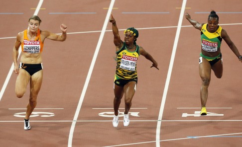 Shelly-Ann Fraser-Pryce wins the 100m final from Dutchwoman Dafne Schippers (left). Photo: EPA