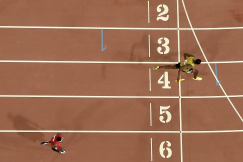 Usain Bolt wins the 4x100m relay for Jamaica. Photo: AFP