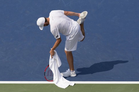 Fish suffered with cramp towards the end of his match. Photo: Reuters