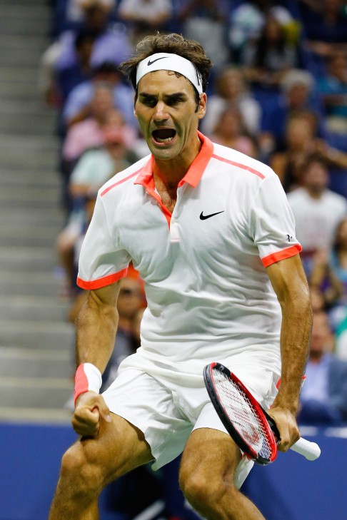 Roger Federer marches on with a straight-sets win against John Isner. Photo: AFP