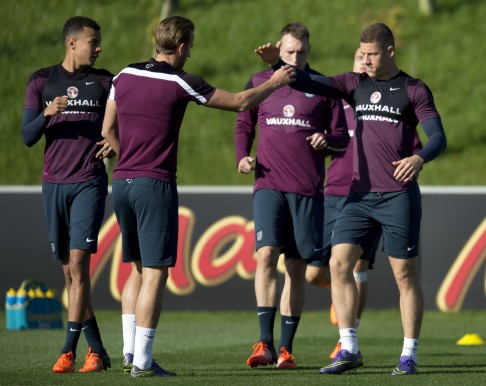 England midfielder Dele Alli (left), striker Harry Kane and midfielder Ross Barkley take part in a training session at St George's Park near Burton-on-Trent. Photo: AFP