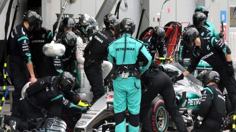 German F1 driver Nico Rosberg retires from the race in the pit lane. Photo: EPA