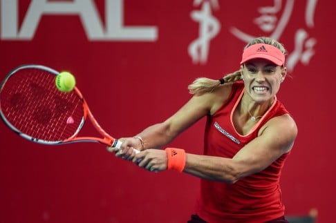 Angelique Kerber of Germany hits a return against Caroline Garcia of France in their women's singles quarter-final at the WTA Hong Kong Open. Photo: AFP