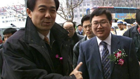 Bo Xilai (left) with Xu Ming in happier times. Photo: SCMP Pictures