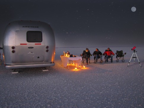 Retro silver airstream trailers allow travellers to luxuriously enjoy the great wilderness.